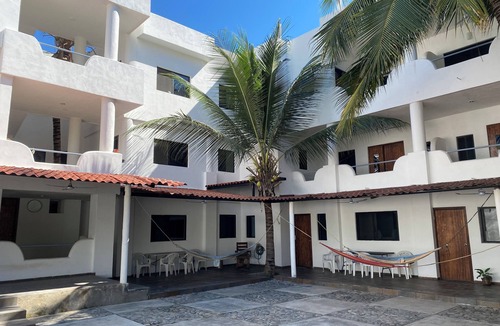 Los Ayala House | Costa Ayala suite 2 with 2 dbl bed and 3 sofas, all basics, 2 blocks from beach