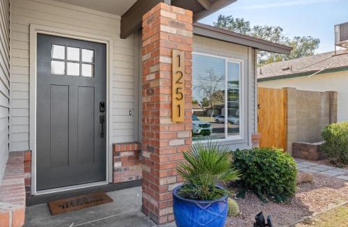 Stoneybrook House | Cottage Evergreen - Outdoor Grille Patio with Putt