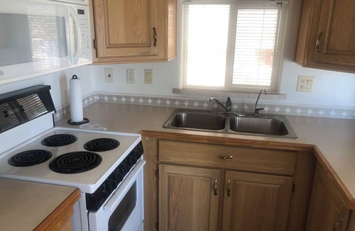 Foothills House | Cozy 1-bedroom mobile home in Yuma Foothills. Additional screened Arizona Room