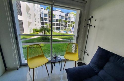 Manzanillo Apartment | Departamento en planta baja, frente a la alberca y terraza, aire acondicionado total y WIFI