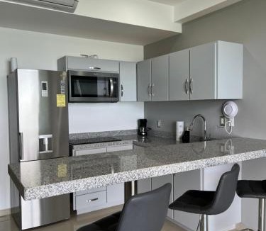 Zona Dorada Apartment | Departamento en Tramonto Resort con vista al mar