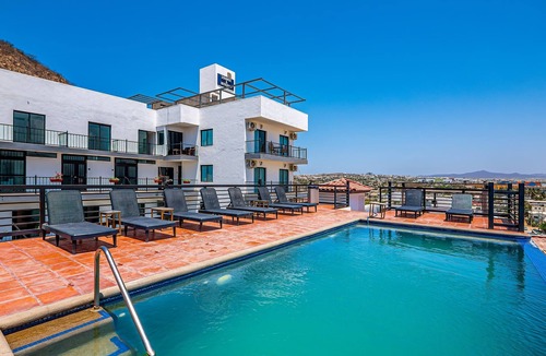 Downtown Cabo San Lucas Apartment | Dog-friendly loft with rooftop infinity pool, gym, balcony, & central AC
