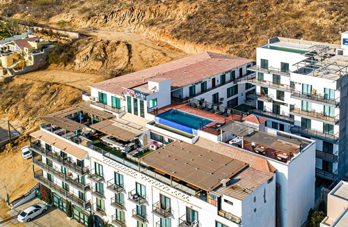 Downtown Cabo San Lucas Apartment | Dog-friendly loft with rooftop infinity pool, gym, balcony, & central AC