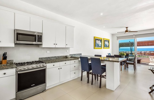La Paloma Villa | Dog-friendly oceanfront villa with pool access, rooftop patio, full kitchen