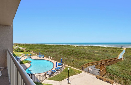 South Padre Island Condo | Edgewater 301 - Wrap Around Balcony! Corner Unit! Heated Pool with Hot Tub!