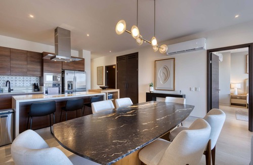 El Tezal Condo | Elegant resort condo with heated pool, pickleball, gym & garden views