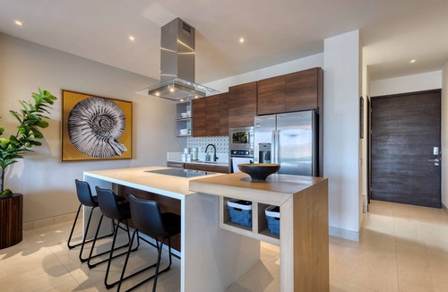 El Tezal Condo | Elegant resort condo with heated pool, pickleball, gym & garden views
