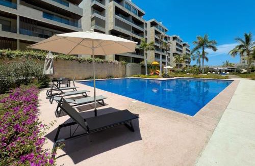 El Tezal House | Elegant resort condo with heated pool, pickleball, gym & garden views