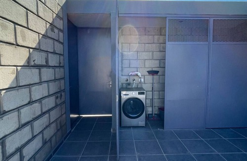 Downtown Guadalajara Apartment | Elegante loft urbano con acceso a gimnasio y salas de trabajo.