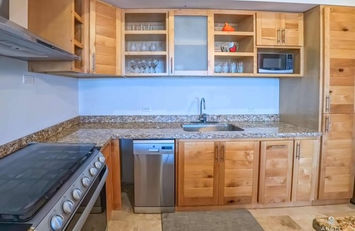 La Paz Condo | Everything Nearby: Beach, Pool, Gym, Tennis