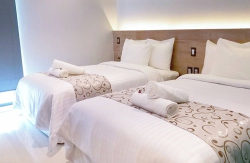 Downtown Cancun Hotel | Explore Cancún’s Best from 3 Modern Rooms with Rooftop Sun Deck Access