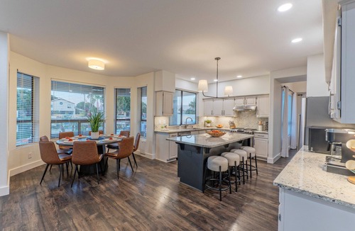 Crystal Shores House | Family Fun Lakefront, Htd Pool, Spa, Putt Green, Kayaks, Covered Patio w/TV, Indoor Games
