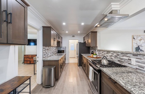 Pacoima House | Fenced 4BR - Pets OK, Park4Cars, W/D, Office Desk!