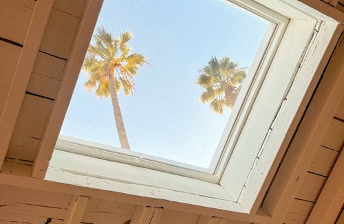 Lower Riviera Apartment | Garden Studio - Sunny deck with views of the Ocean and walkable to Downtown.