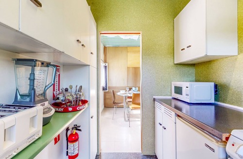 Uptown Design District Apartment | Historic flat in the heart of downtown with pool access and private terrace