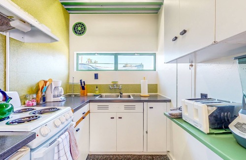 Uptown Design District Apartment | Historic flat in the heart of downtown with pool access and private terrace
