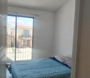 Queretaro House | House A in a residential condominium with a pool