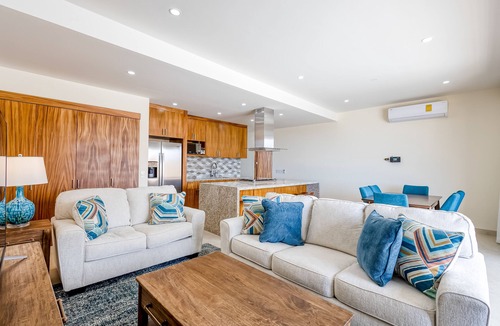 Libertad Apartment | Immaculate stay with stunning views, balcony, plus on-site pool & gym