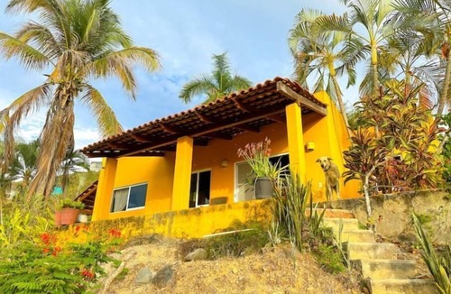 Compostela House | La Casa Chilam - A hidden hillside retreat. Close to beaches and Pet Friendly!
