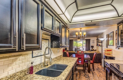 Desert Shores Condo | Lake Front Balcony! Quiet community! Walking path! Restaurants! Heated Pool