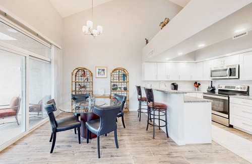 Townhomes On Coral Reef House | Lake view desert stay with pool, patio, grill, & smart TVs - snowbird-friendly