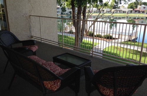 Desert Shores Condo | LAKEFRONT-BEAUTIFUL, PEACEFUL VIEWS-HEATED POOl & JACUZZI