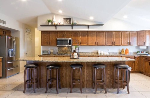 Avondale House | Large oasis, pool heater, spa, putting green