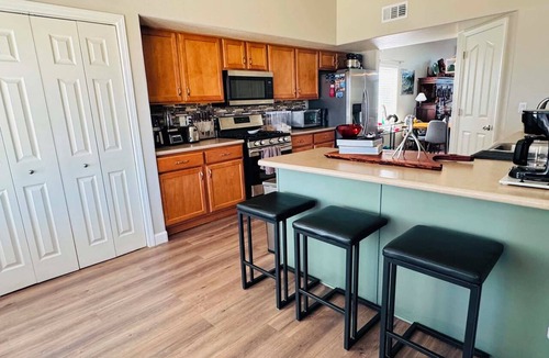 Corona de Tucson House | Large secondary primary bedroom with private bathroom in peaceful, stylish home