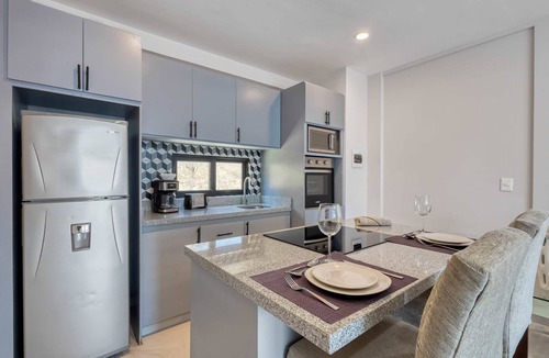 Downtown Cabo San Lucas Apartment | Loft close to the ocean with rooftop infinity pool, balcony & gym - dog-friendly