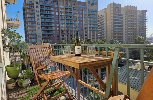 East Village Condo | Luxe Suite one bedroom condo with free parking, balcony and partial ocean view.