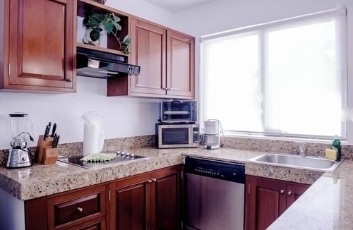 Gonzalo Guerrero Villa | Luxurious 1-Bedroom condo on Calle 38 with beautiful pool. A Playa favorite!