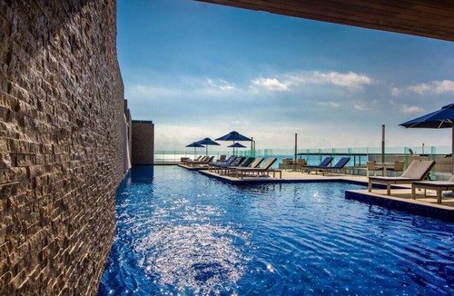 Gonzalo Guerrero Condo | *LUXURIOUS* One Bedroom Condo behind Mamitas Beach