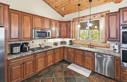 Castle Glen Estates Cabin | Luxury in Castle Glen! HOT TUB! Game Room with Pool Table! Lake Views! Multiple Decks and Fireplaces!