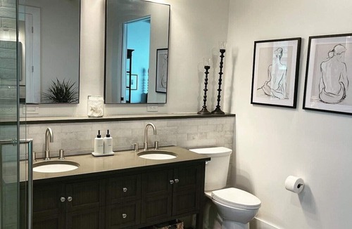 West University Hotel | Luxury king suite downtown w/lush garden terrace