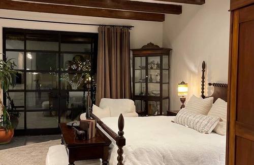 West University Hotel | Luxury king suite downtown w/lush garden terrace