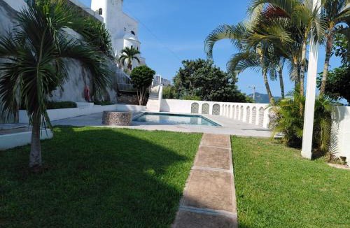 Las Hadas House | Manzanillo Home with Stunning Roof Top Ocean Views