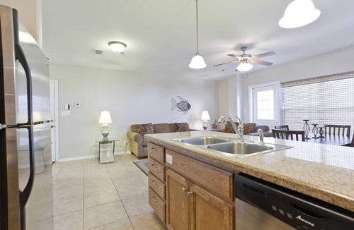 South Padre Island Condo | Marlin 12-Beachy cottage;Kiddie pool;Balcony over pool;Lawn
