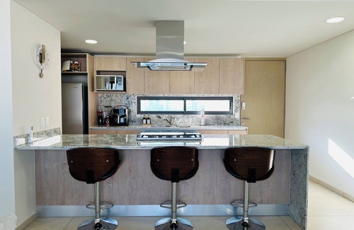 Financial District Condo | Modern 2BR Condo in Providencia; City Views, Pool & Gym
