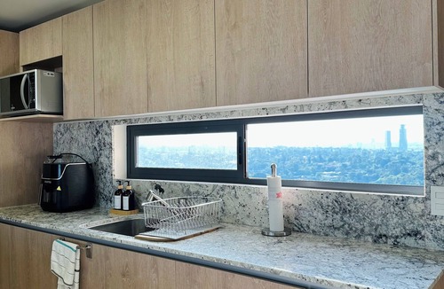 Financial District Condo | Modern 2BR Condo in Providencia; City Views, Pool & Gym