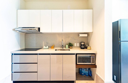 Puerto Morelos Condo | Modern Studio w/Two Pools, Hot Tub and Free Bikes