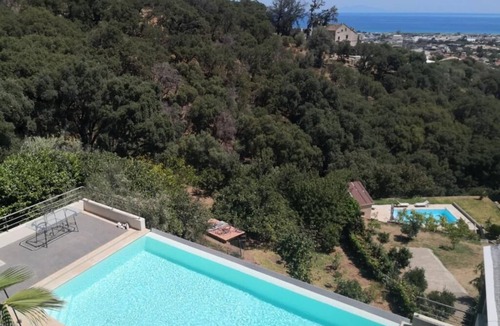 Furiani Apartment | Modern studio with magnificent sea view in a quiet, leafy setting