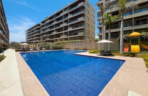 El Tezal House | Modern studio with rooftop lounge, pools, gym, pickleball & Netflix access