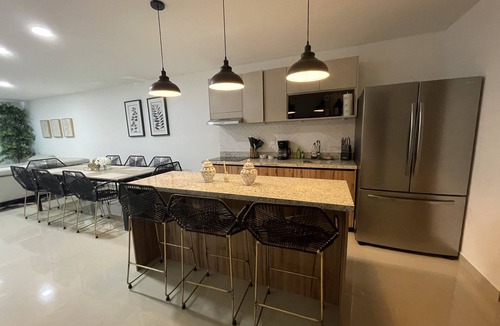 Mazatlan Condo | New modern 2 bed 2 bath condo steps away from the beach with rooftop pool deck!