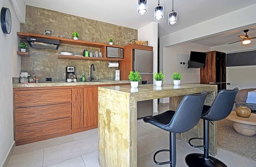 La Paz Apartment | New apartment with communal pool, steps from beach