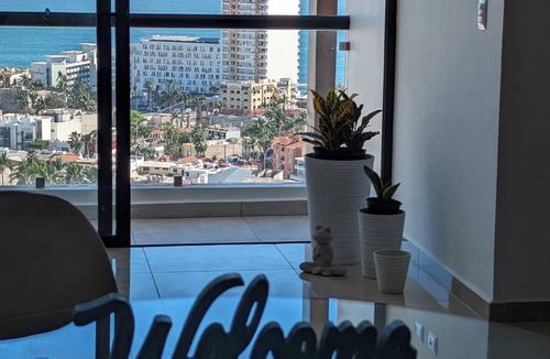 Zona Dorada Apartment | NEW! Beautiful condo with a stunning view across the beach in Golden Zone.