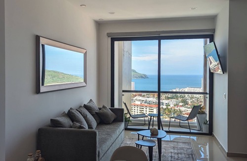 Zona Dorada Apartment | NEW! Beautiful condo with a stunning view across the beach in Golden Zone.