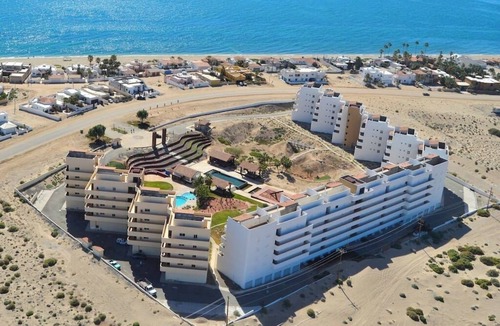 Las Conchas Condo | Ocean View Condo with Pools and Easy Beach Access