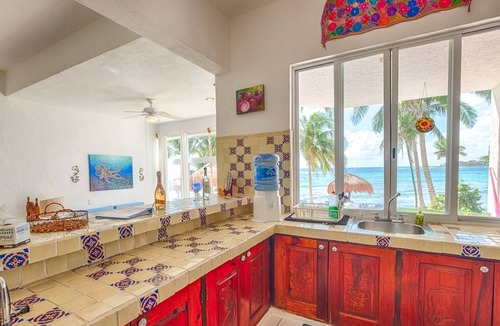 Akumal Condo | Oceanfront Living with Direct Beach Access and Lush Poolside Gardens!
