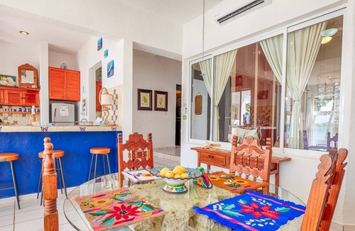 Akumal Condo | Oceanfront Living with Direct Beach Access and Lush Poolside Gardens!