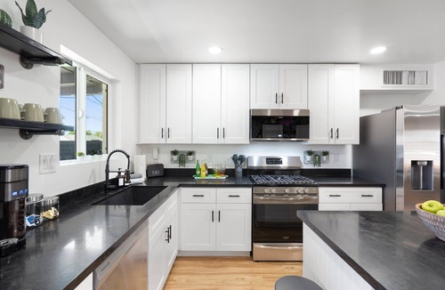 Cox Heights House | Old Town Papago Abode with Resort-Style backyard with Pool, Hot Tub, & Games +pet friendly